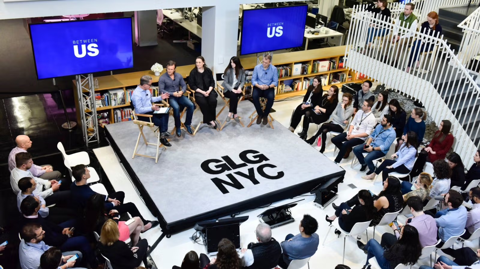 Christina Dobi on stage at GLG's Between Us panel in New York